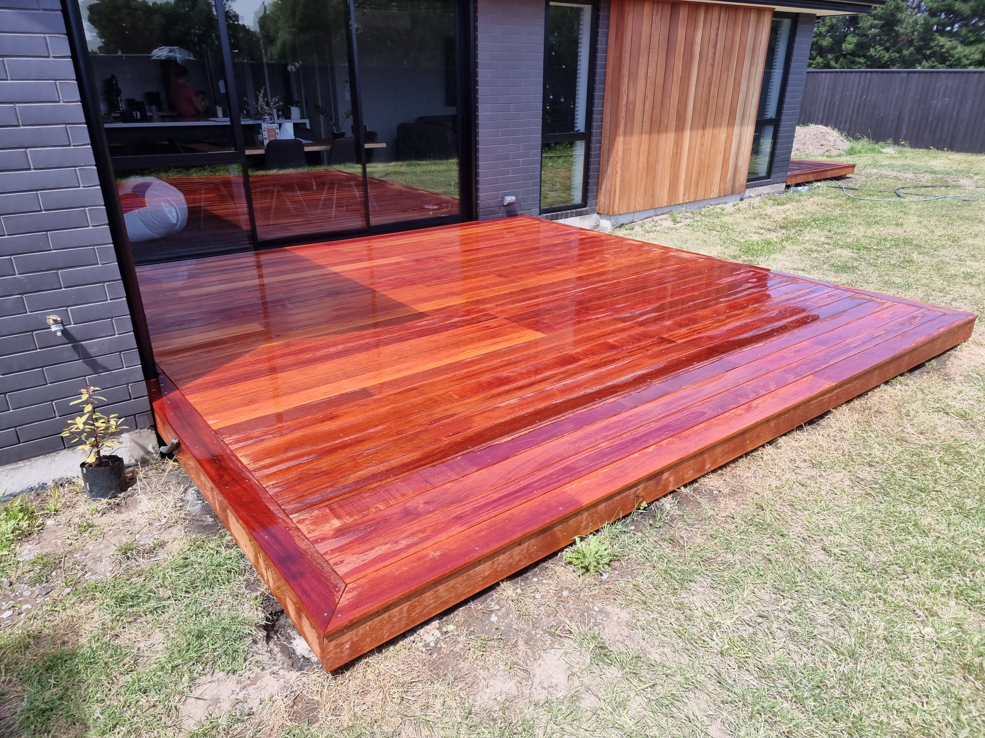 Finished hardwood deck construction detail